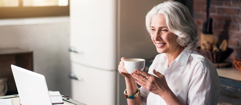 senior woman reading about senior living continuum of care